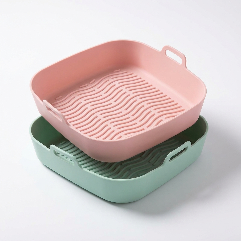 Reusable silicone air fryer liner 2-pack pink and green, professional white background